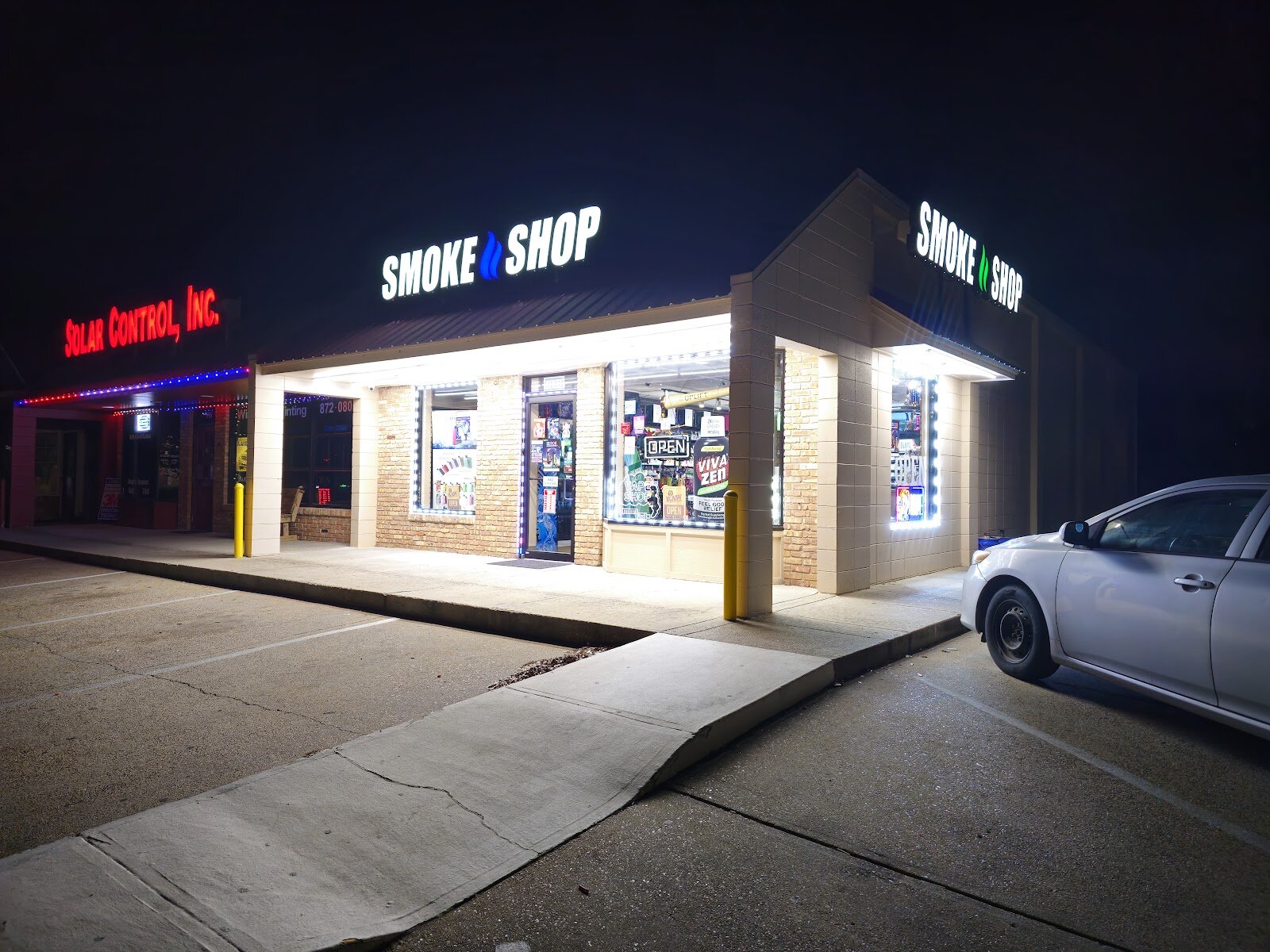 Storefront of OS smoke shop, Ocean Springs.